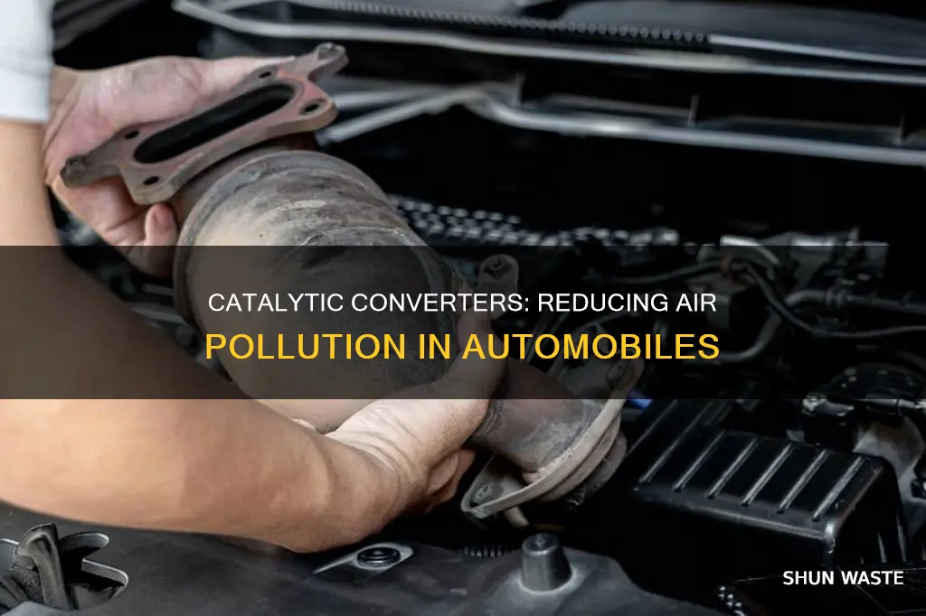 how do automobiles fitted with catalytic converters reduce air pollution