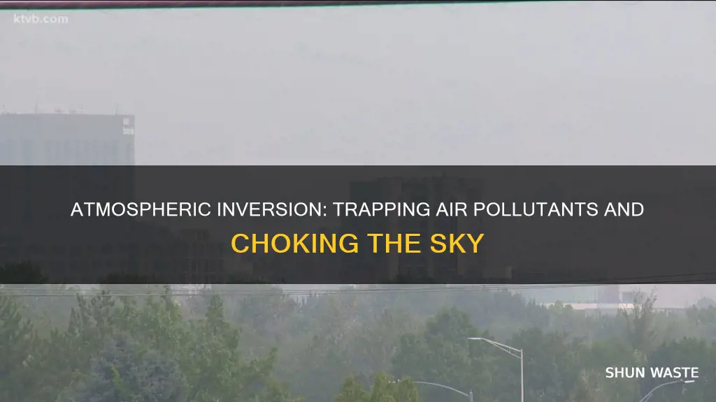 how does atmospheric inversion trap air pollutants